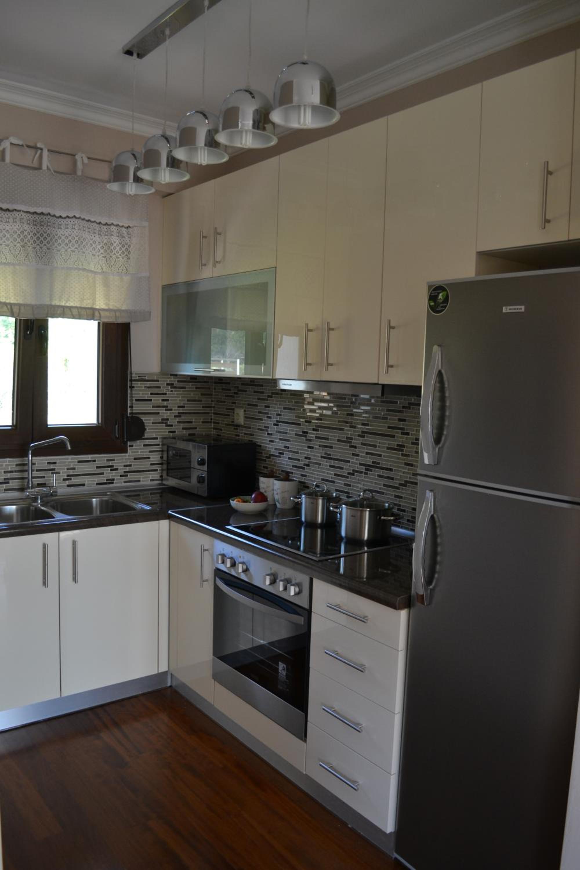 Фото Evmorfes Villas