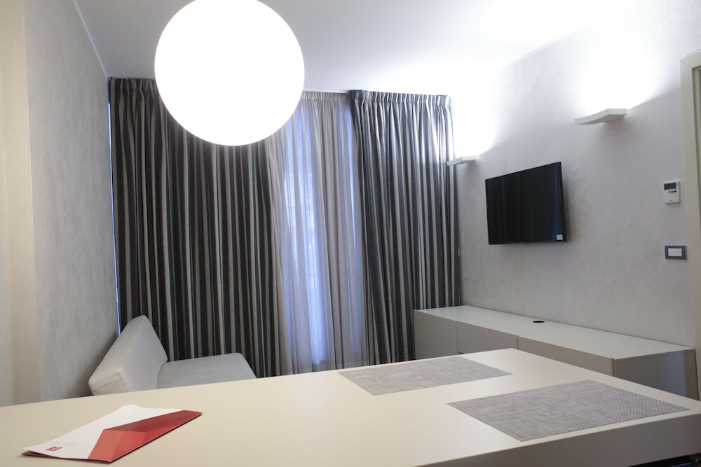 Фото Home Club Suite Hotel