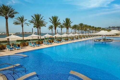 Внешний вид отеля Hilton Dubai Palm Jumeirah в Пальме Джумейре, фото 4