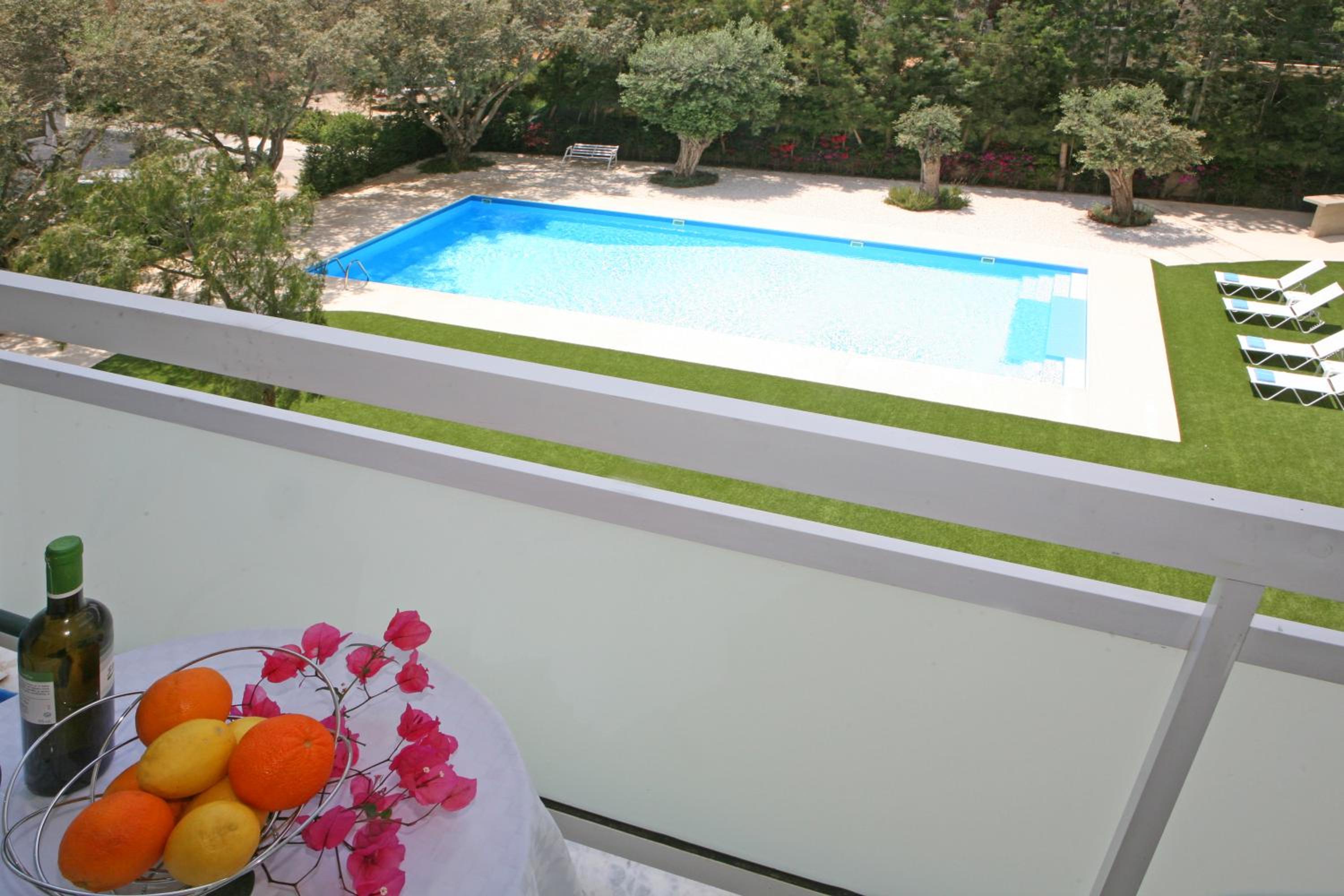 Фото Corina Suites and Apartments