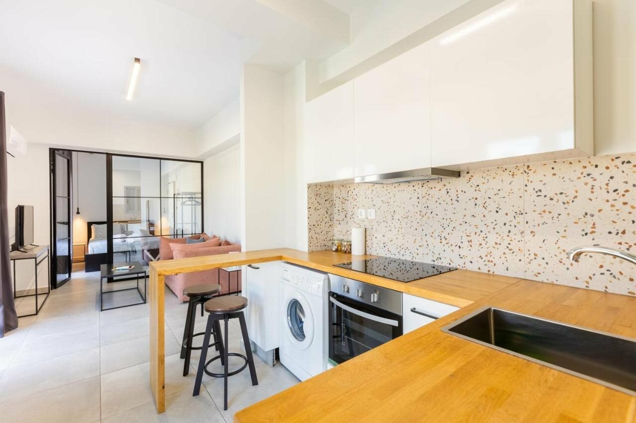 Фото Omnia Pagrati Apartments