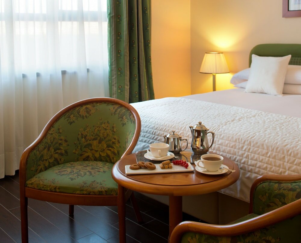 Фото Starhotels Business Palace