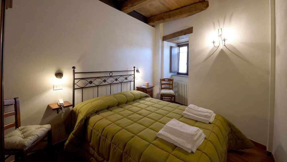 Фото Borgotufi Albergo Diffuso