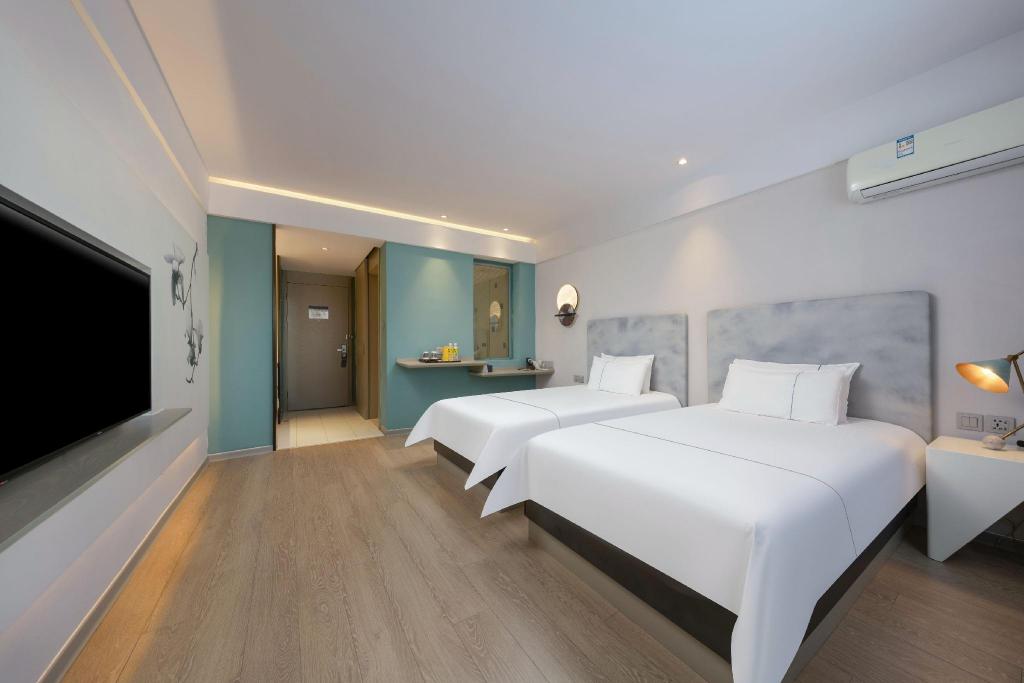 Фото Magnotel Jining Jiaxiang, Zengzi Avenue Hotel