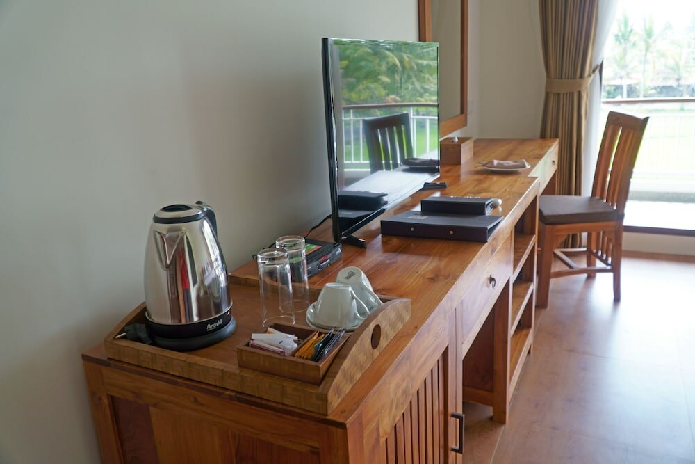 Фото Paon Desa Ubud Hotel