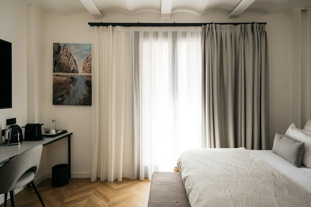 Фото Boutique Hotel Petit Montisión