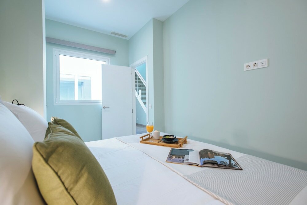 Фото Sercotel Sevilla Guadalquivir Suites