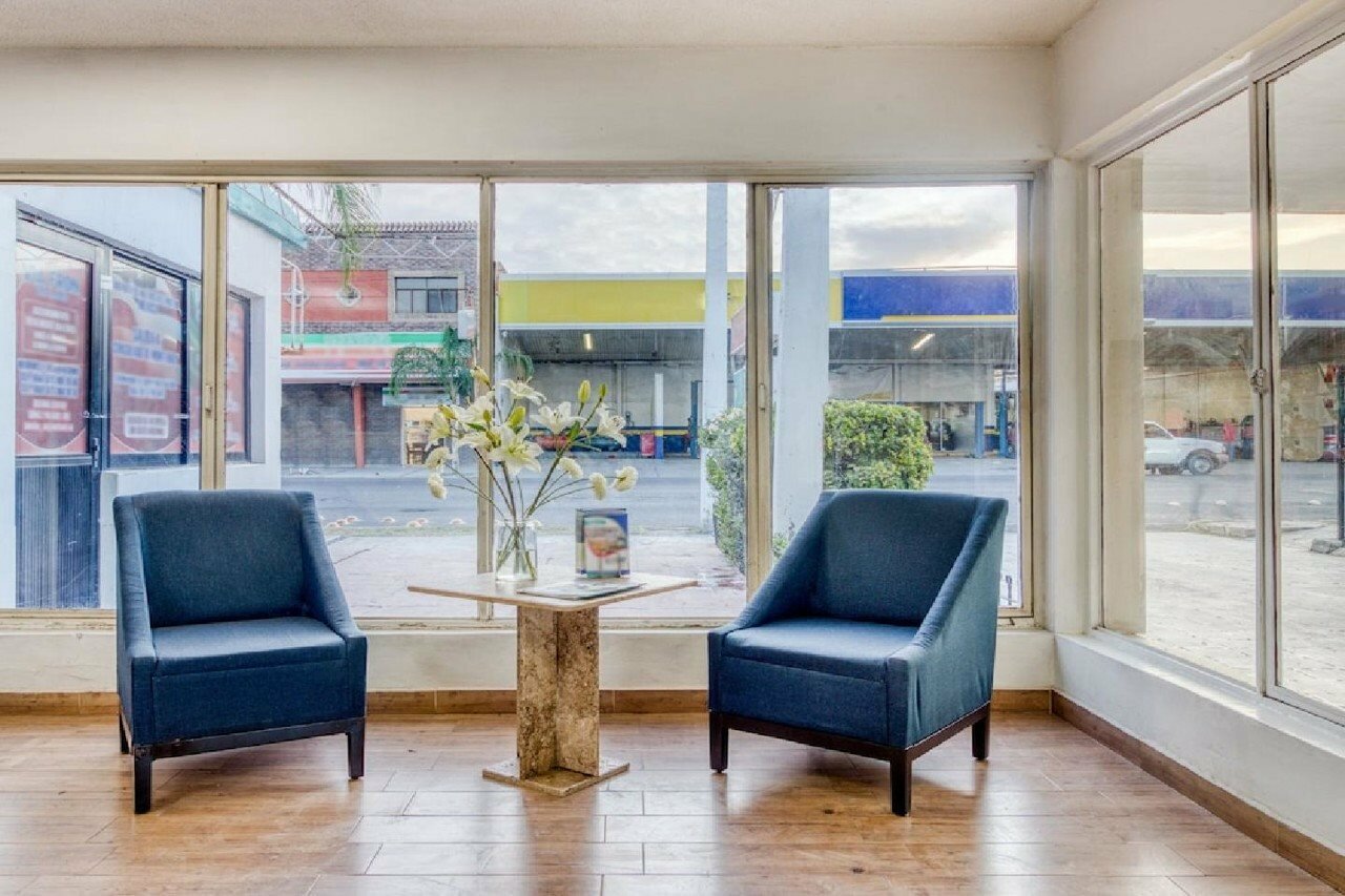 Фото Capital O Hotel La Siesta, Gómez Palacio