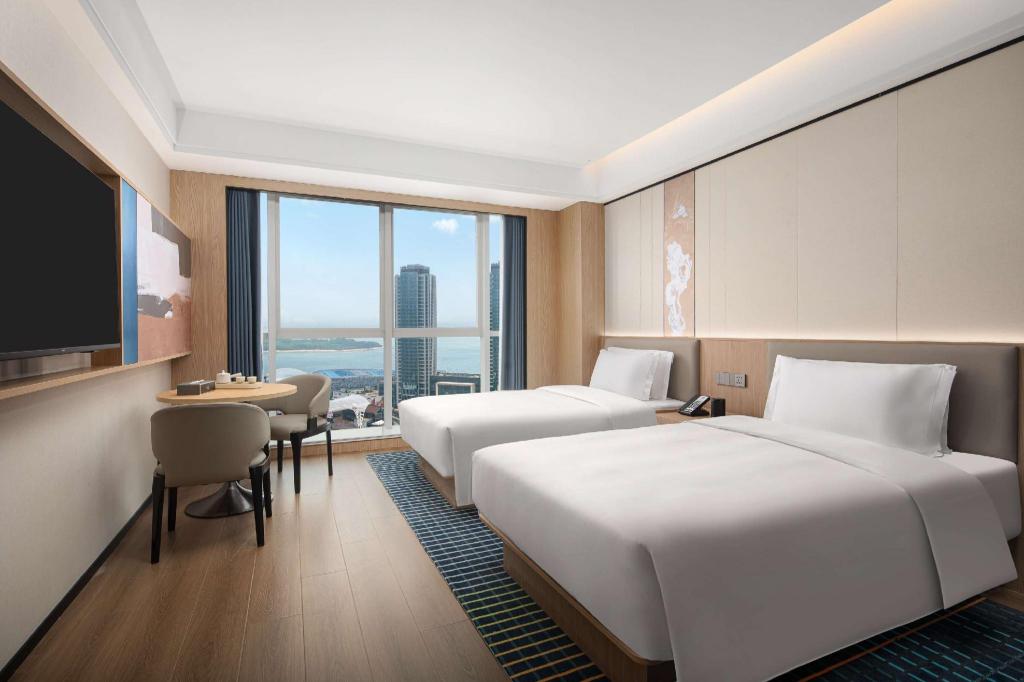 Фото Microtel by Wyndham Qingdao Huangdao