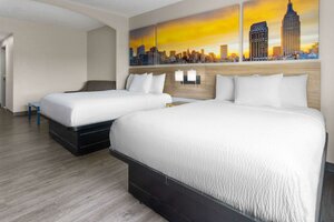 Гостиница Days Inn & Suites by Wyndham Albany