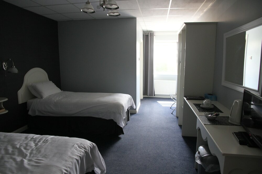 Фото 5 Corners Guest Inn