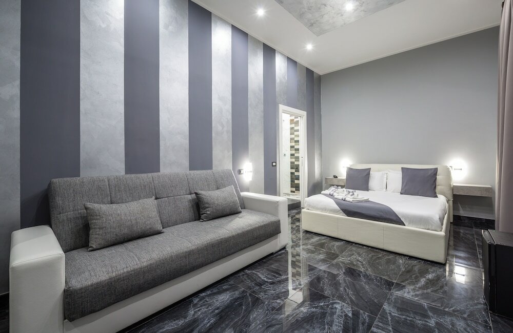 Фото Hotel Bella Napoli Suites