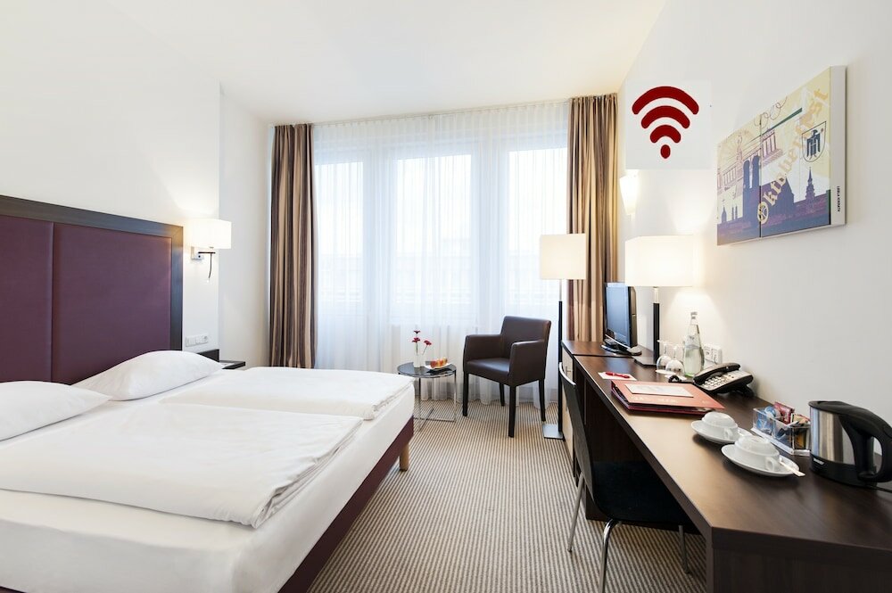 Фото Acom-Hotel Munich