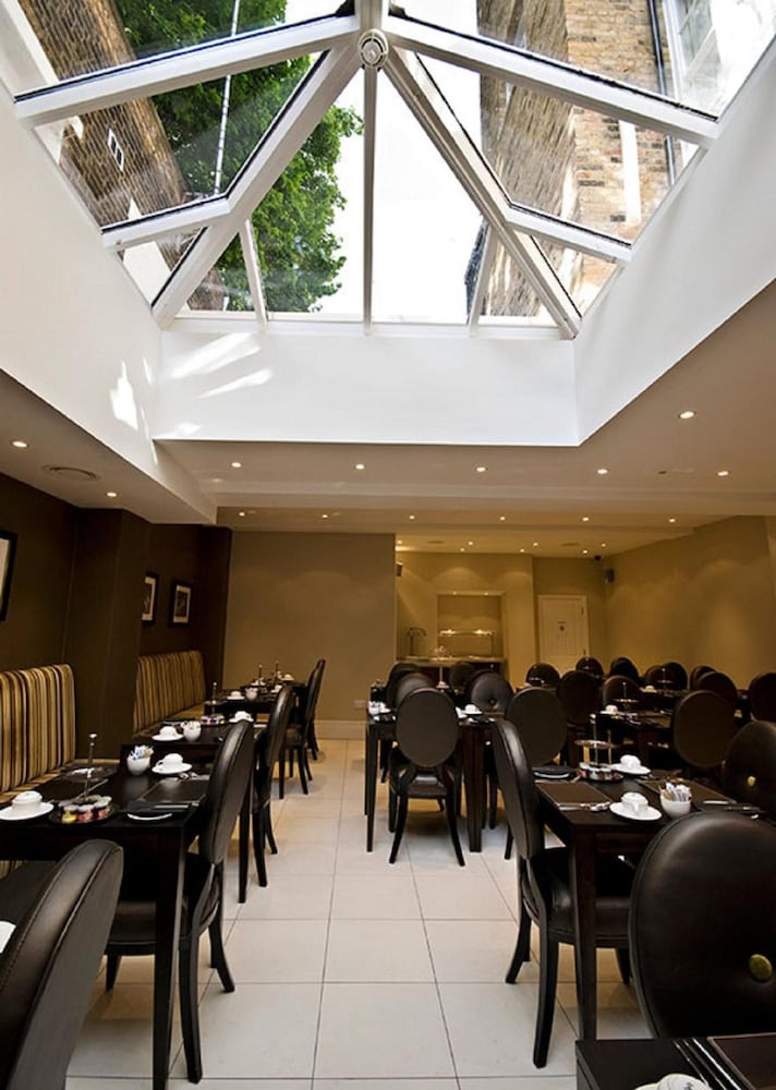 Фото Tophams Hotel