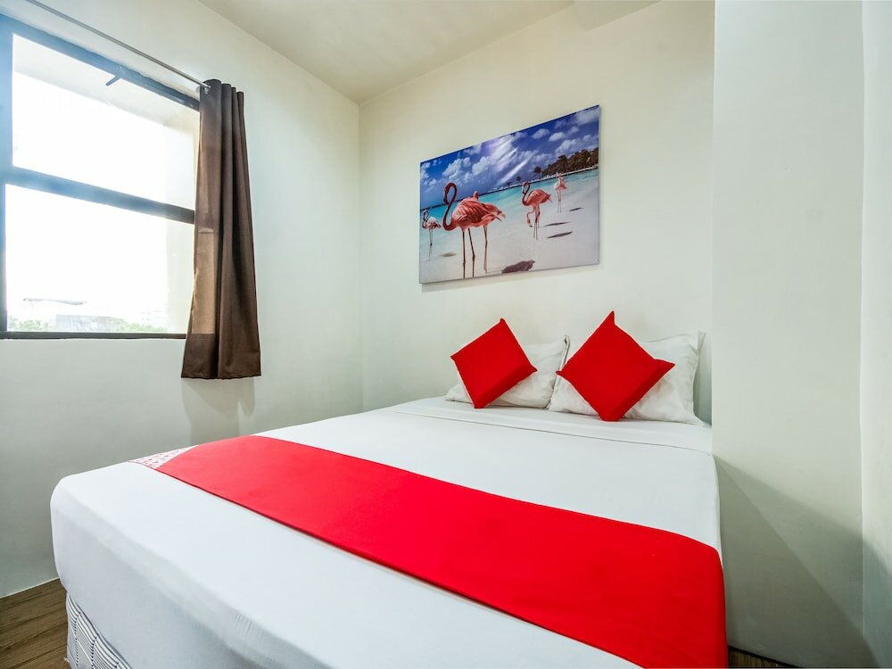 Фото Oyo 443 Maria Cristina Arcade Suites