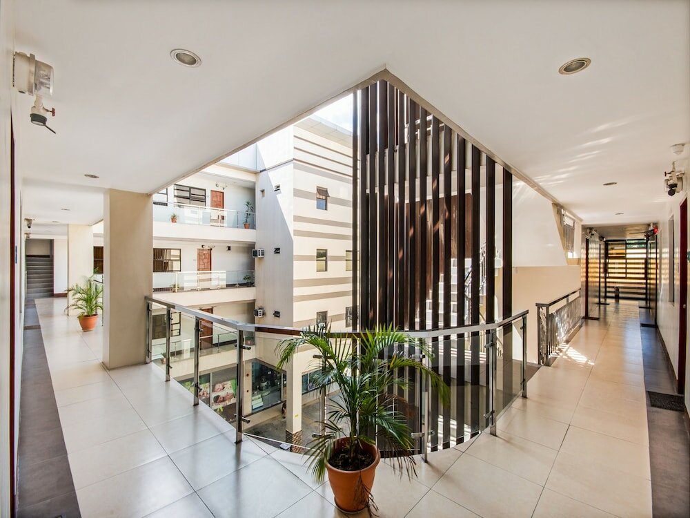 Фото Oyo 443 Maria Cristina Arcade Suites