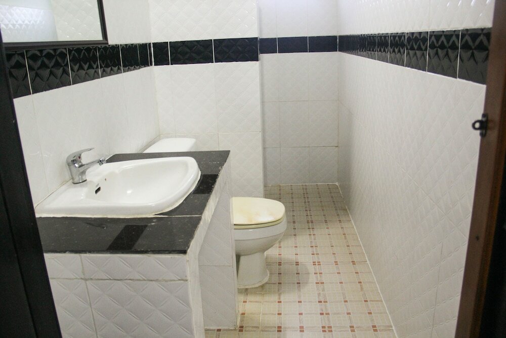 Фото Tropical Breeze Guesthouse