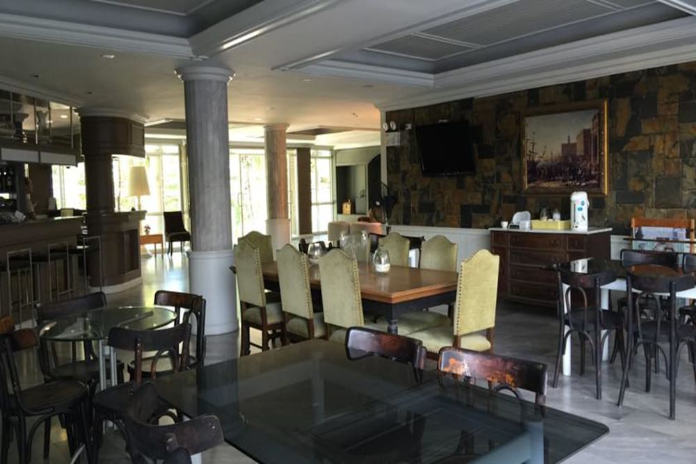 Фото Garden Paradise Hotel & Serviced Apartment