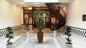 Гостиница Heeren Palm Suites