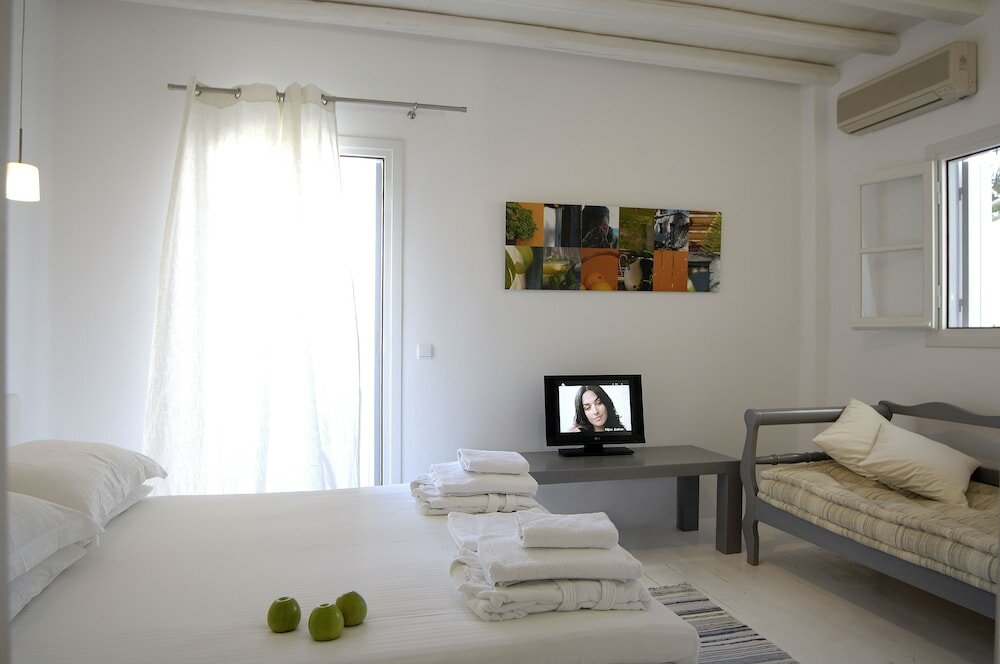Фото Kapetan Tasos Suites