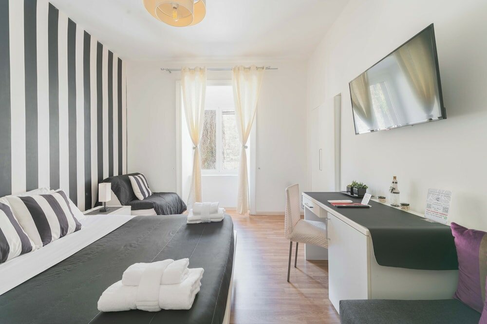 Фото Rione Monti Suites