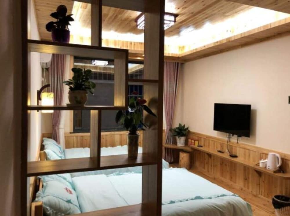 Фото Zhangjiajie Yunqi Inn