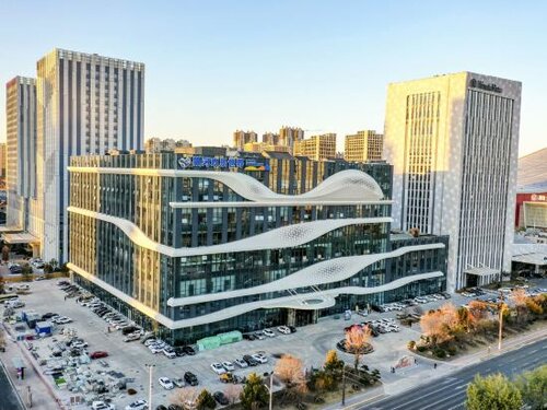 Гостиница Yinhe Happy World Hotel в Харбине