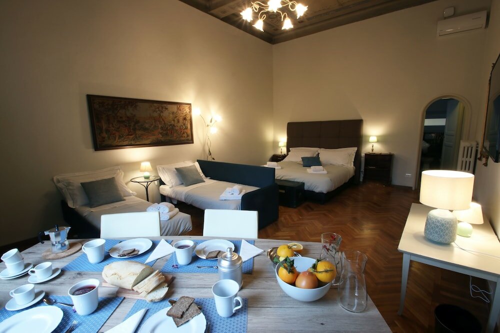 Фото Corsini Tintori Guest House