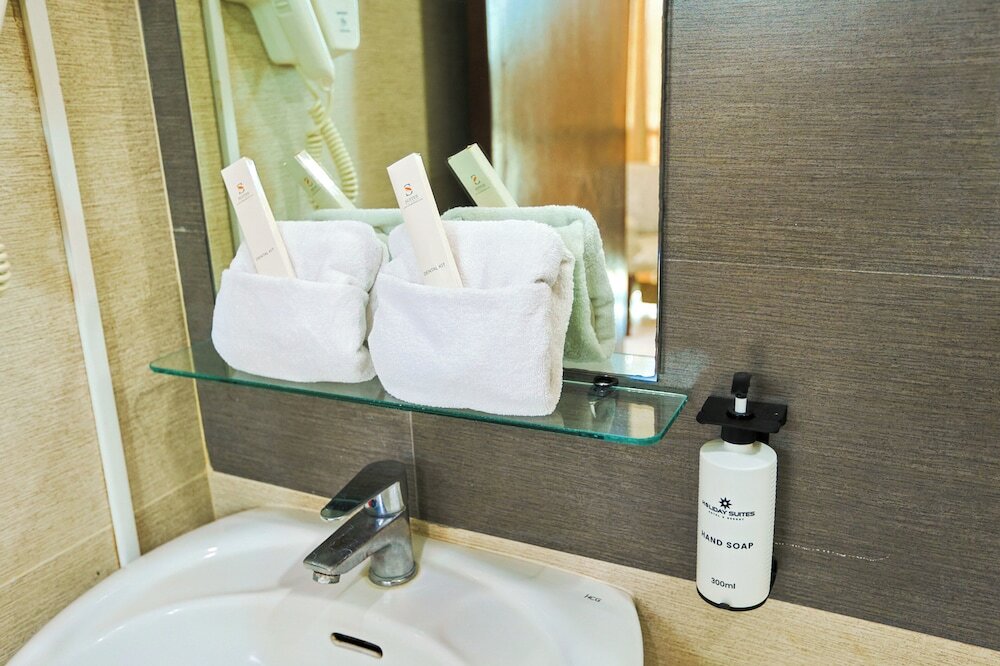 Фото Empire Suites Hotel