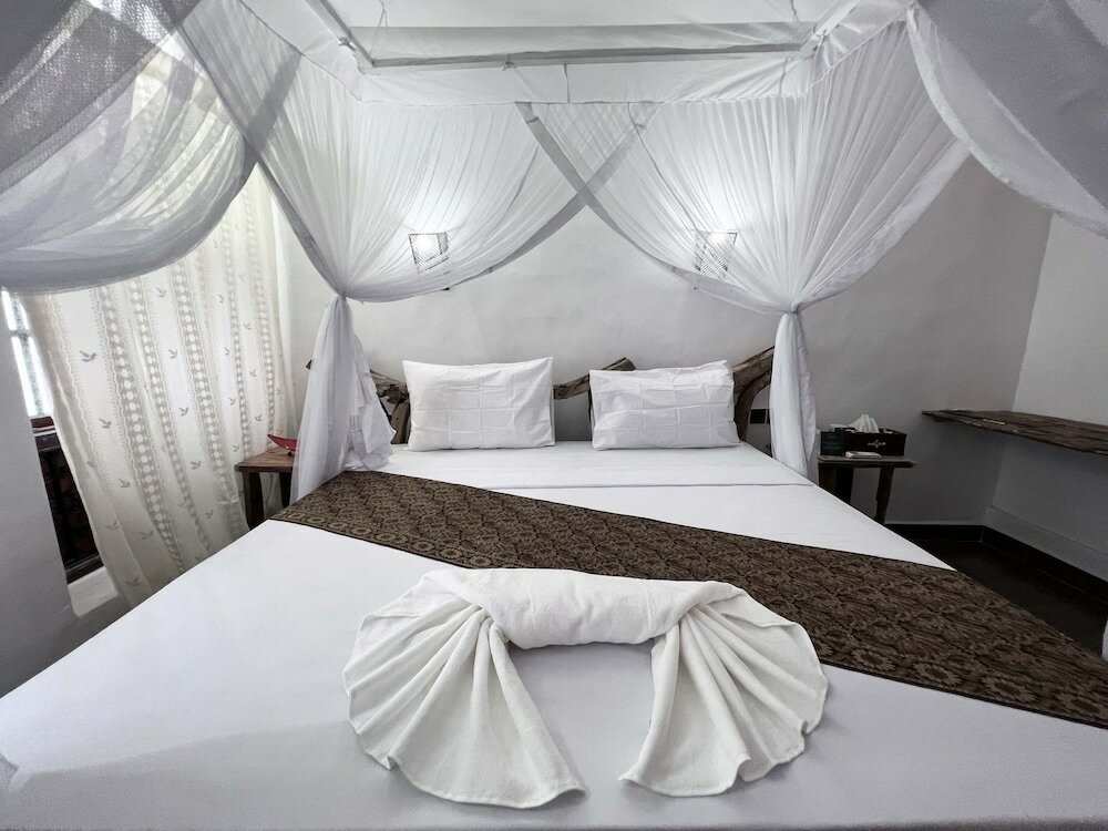 Фото Zanzi House