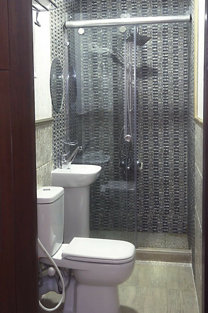 Фото Tahrir Plaza Suites