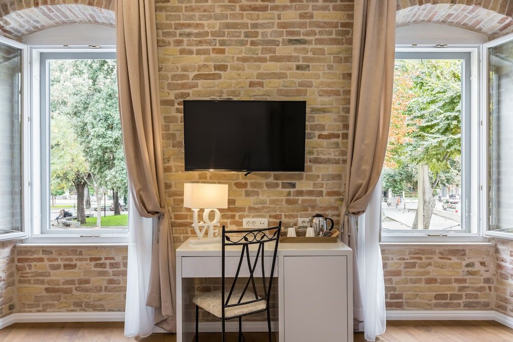 Фото Pellegrini Luxury Rooms