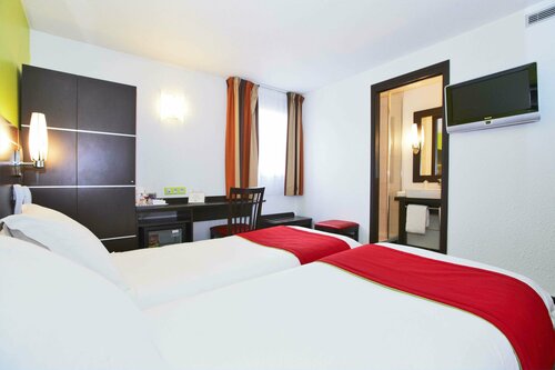 Гостиница Kyriad Design Enzo Reims Tinqueux