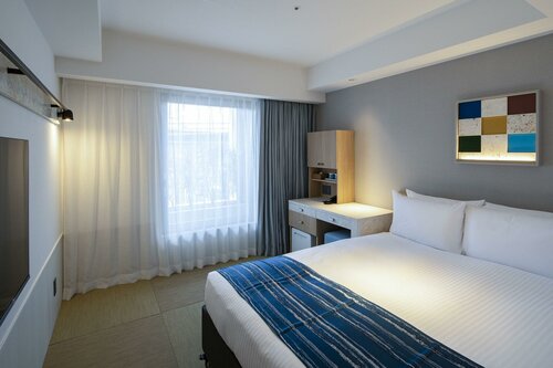 Гостиница Okinawa Hinode Resort and Hot spring Hotel в Нахе