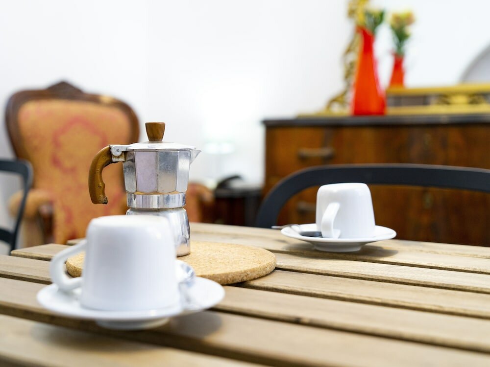 Фото Salotto Piramide B&b