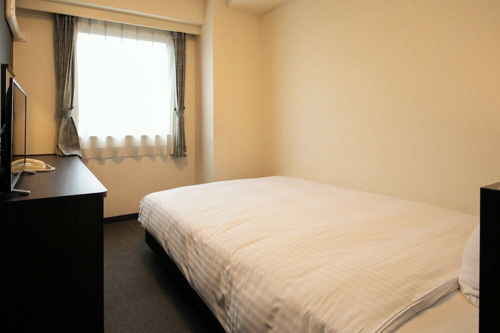 Фото Kochi Sunrise Hotel