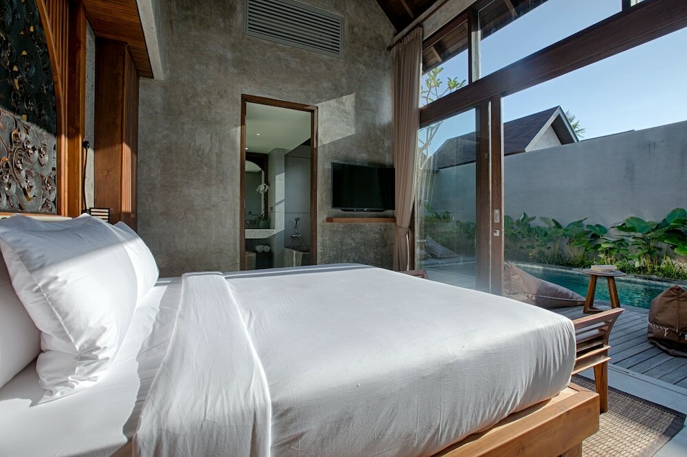 Фото Taman Dharmawangsa Suites