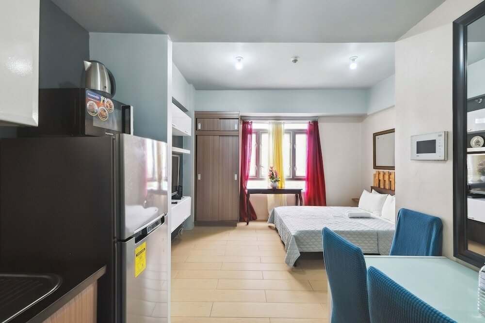 Фото Tess and Tessha Condotel near T3 Airport