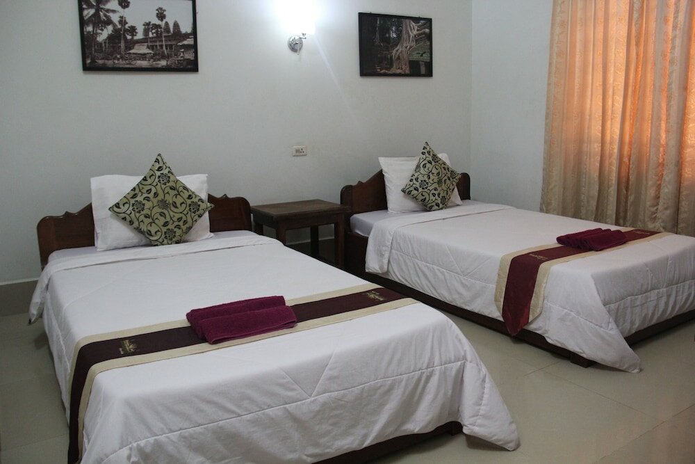 Фото Tropical Breeze Guesthouse