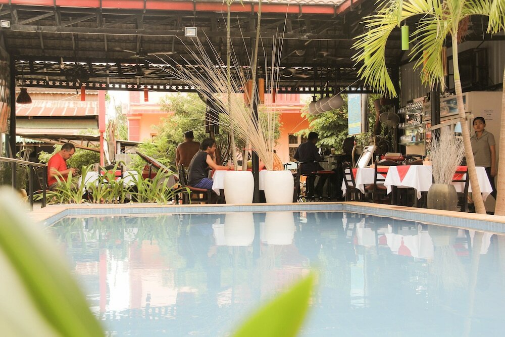 Фото Tropical Breeze Guesthouse