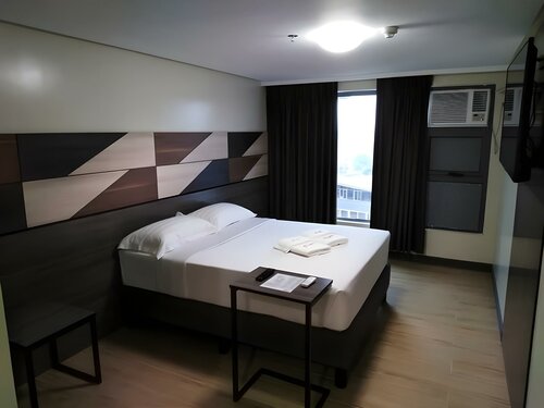 Гостиница Travelite Hotel Legarda в Багио