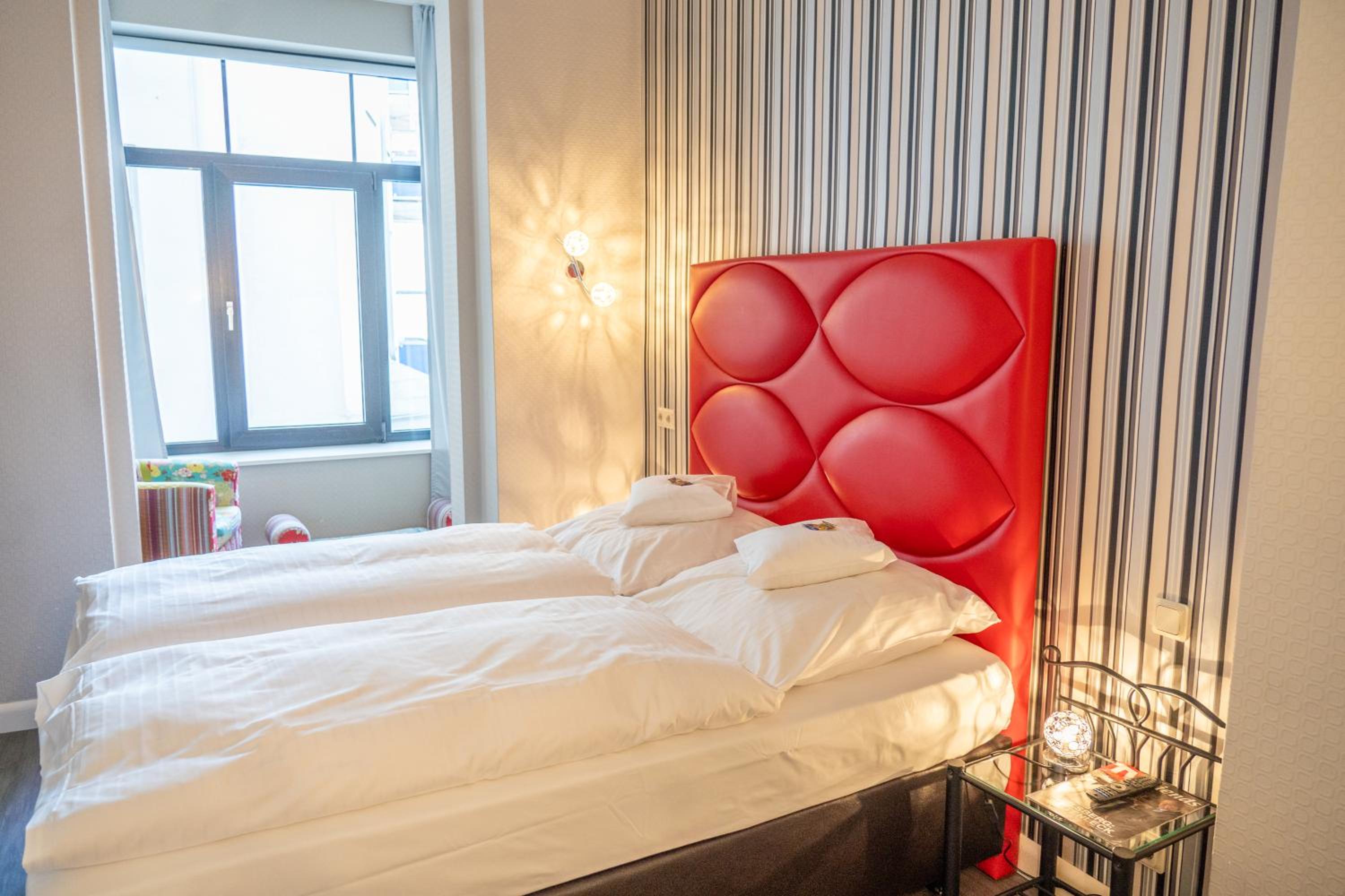 Фото Haus Martens Das Lister Stadthotel