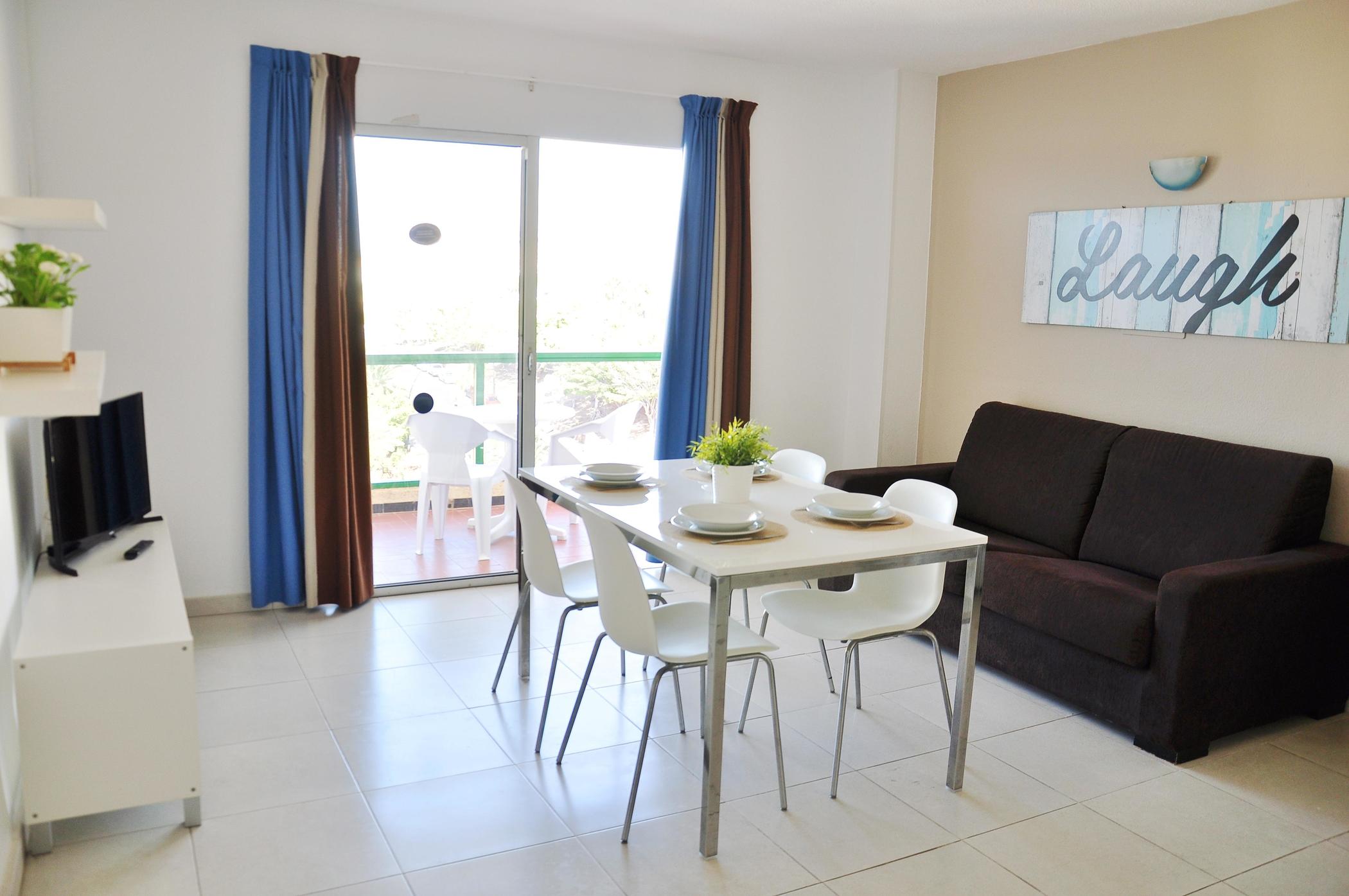 Фото Comodoro Apartments