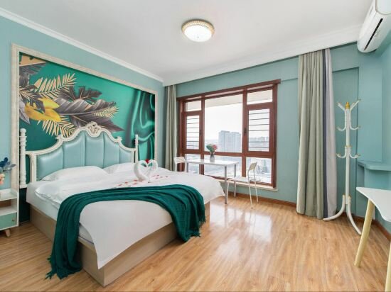 Apartments Dalian south China Plaza Hotel apartment, Dalian, photo