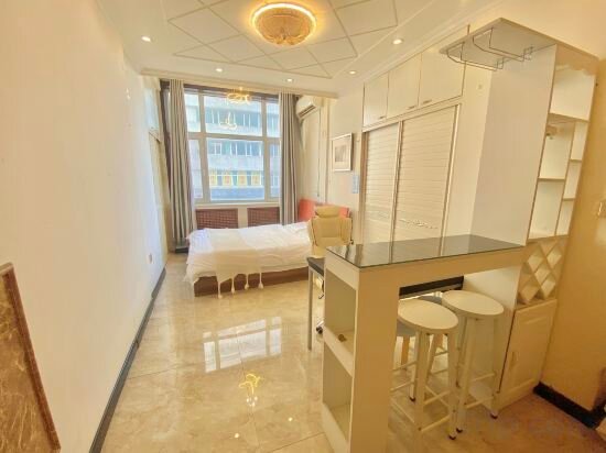 Hotel Qiyue Homestay, Harbin, photo