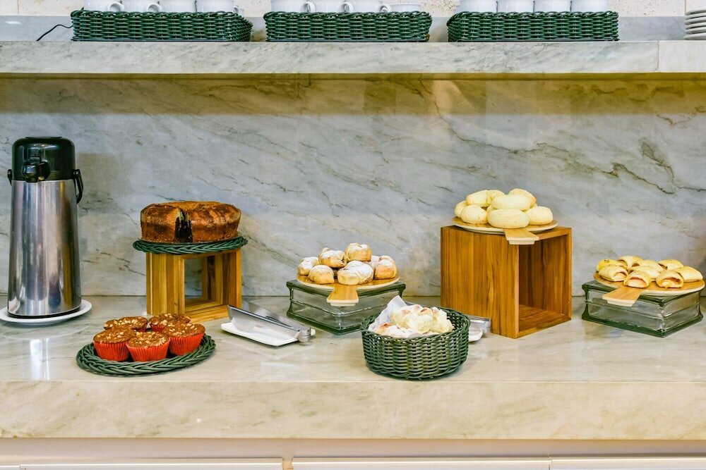 Фото Plaza Inn Breeze Aeroporto