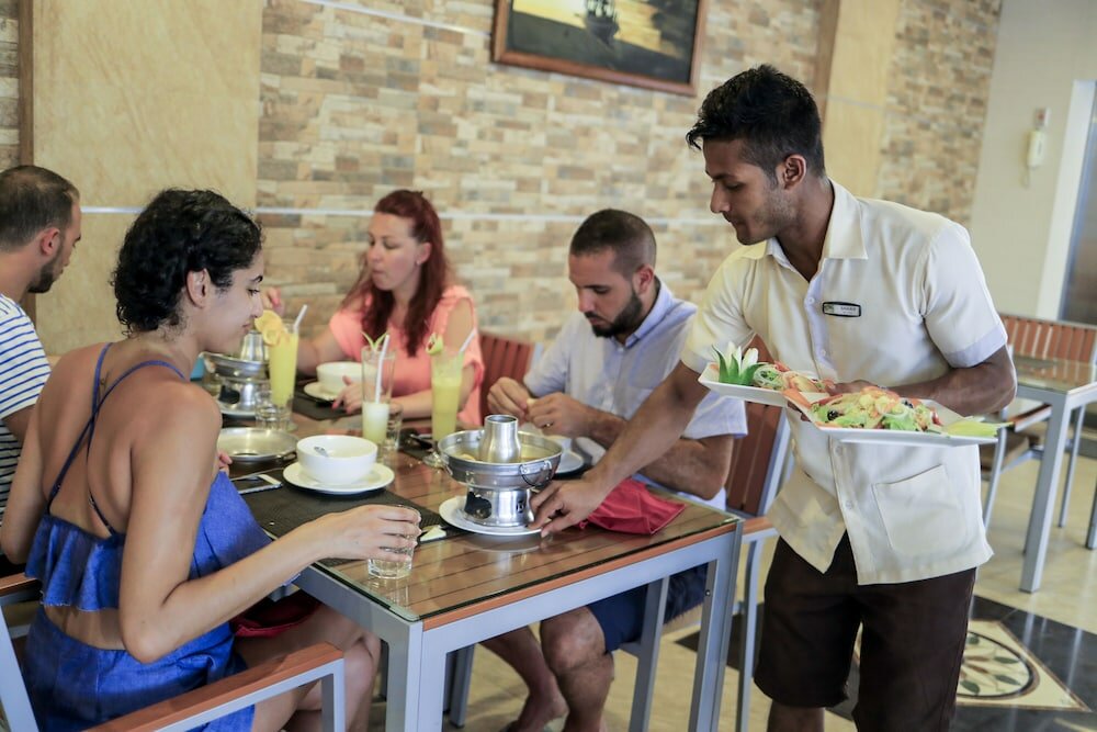 Фото Triton Beach Hotel & SPA