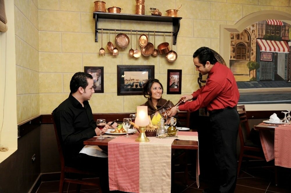 Фото Grand Pyramids Hotel