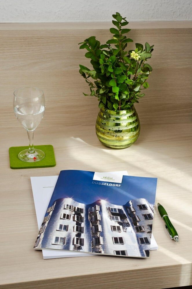 Фото Hotel Am Hofgarten