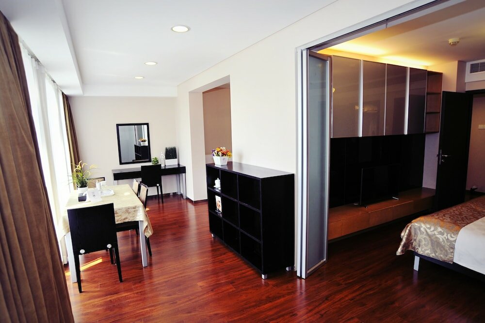 Фото Qingdao Housing International Hotel